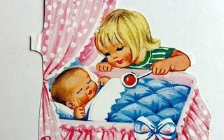 Tyttö hoitaa nukke vauvaa Kiiltokuva