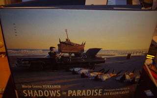 Hukkanen : Shadows in paradise ( 1 p. 1997 ) Sis. postikulut