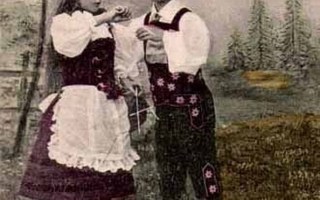 LAPSI / Poika kiusoittelee neulovaa tyttöä. 1900-l.