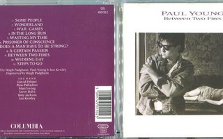 PAUL YOUNG . CD-LEVY . BETWEEN TWO FIRES