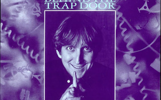 T-Bone Burnett – Behind The Trap Door