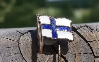 Emalinen Suomen lippu. Halkaisija - 15 mm. Ehjät emalit.