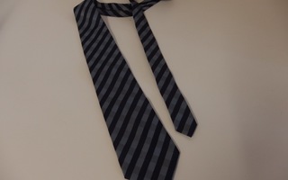 Tyylikäs Jan Stuart -solmio,  tummansinisen ja harmaan sävyt