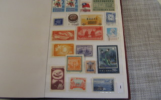 Kiina postimerkkejä 315  kpl kansiossa.
