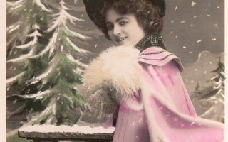 Vanha postikortti- nainen lumisateessa