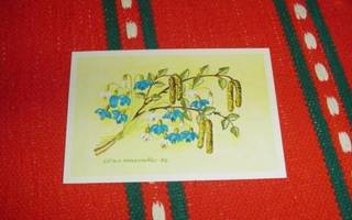 Postikortti kukkia ja puun oksia. Leila Myllymäki 1986