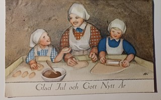 Ati: Äiti ja lapset leipovat Jouluksi herkkuja, p. 1939