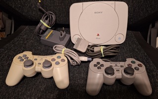 Ps one konsoli + 2 ohjainta (Ei Av-johtoa)