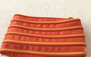 Oranssi zip-it vetoketjupussukka