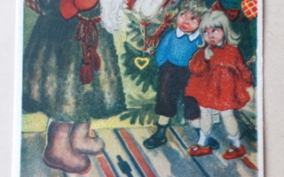 Vanha joulukortti, pukki, kuusi ja lapset v. 1976