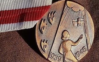 Kotirintamanaisten mitali/ Medal for the Women of Home Front