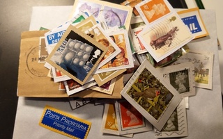 Englantilaisia ja irlantilaisia postimerkkileikkeitä 30 g.