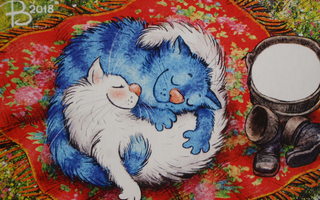 Irina Zeniuk ihastuneet kissat kippurassa viltillä
