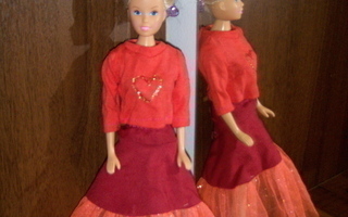 Neljä vaatetta ja yhdet kengät Barbielle