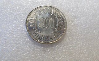 200  mk  1957  hopeaa    lyöntikiiltoinen  kulkematon,