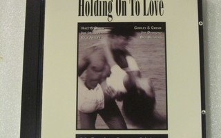 Kokoelma • Holding On To Love CD